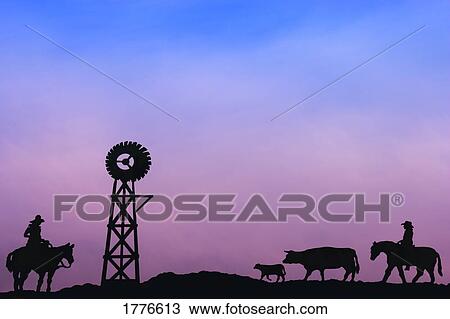 Stock Image - End of the day at cattle round up Southern Alberta Canada. Fotosearch