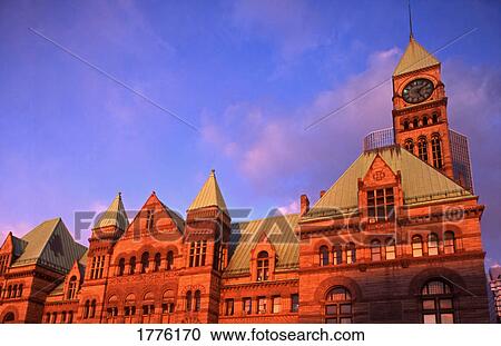 Front of red brick building with clock tower View Large Photo Image Stock Image - Front of red brick building with clock tower. Fotosearch