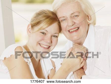 Granddaughter and grandma View Large Photo Image Stock Photo - Granddaughter and grandma. Fotosearch