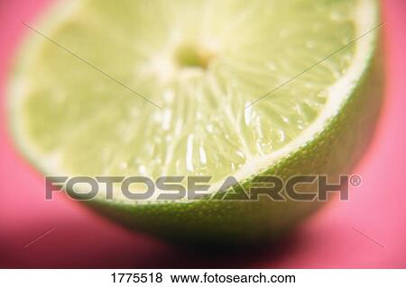 Half a fresh lime View Large Photo Image Stock Photo - Half a fresh lime. Fotosearch