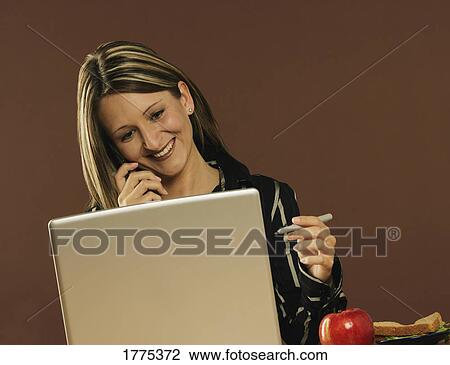 Happy working lunch View Large Photo Image Stock Image - Happy working lunch. Fotosearch