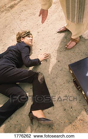 Stock Image - Jesus helps a businesswoman. Fotosearch