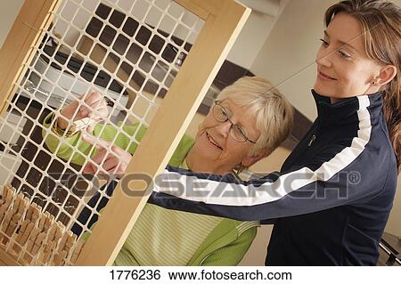 Mature student receives guidance View Large Photo Image Stock Photograph - Mature student receives guidance. Fotosearch