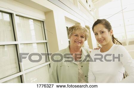 Stock Photo - Portrait of two adult women. Fotosearch