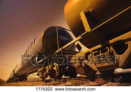 Railway cars carrying liquid cargo View Large Photo Image Stock Image - Railway cars carrying liquid cargo. Fotosearch