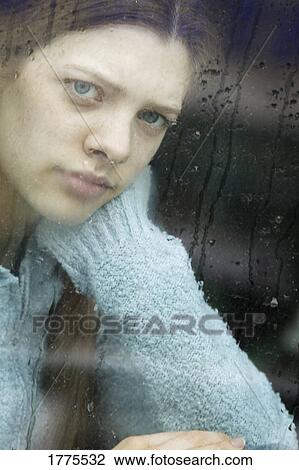 Stock Image - Rainy day boredom. Fotosearch