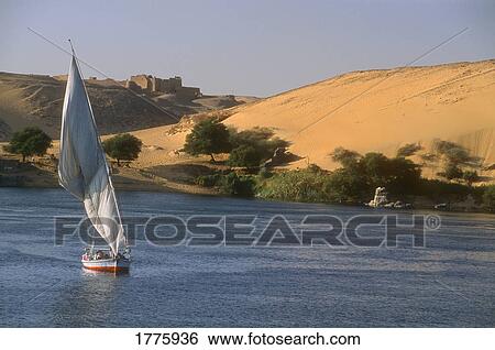 Stock Photograph - Sailboat on water. Fotosearch