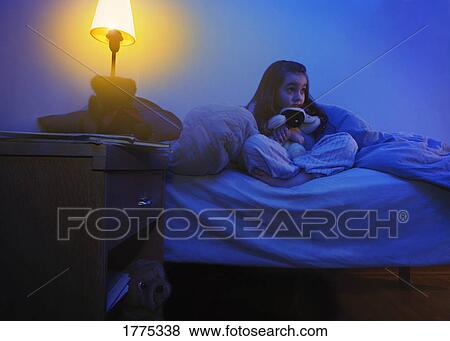 Stock Photo - Scared of the dark. Fotosearch