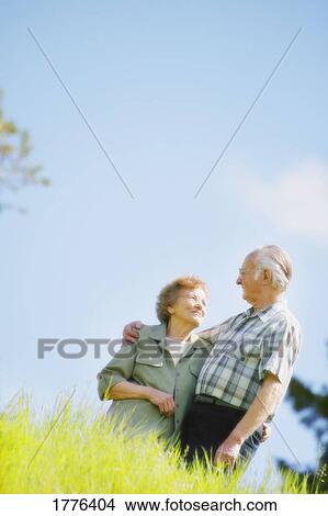 Picture - Senior couple walking. Fotosearch