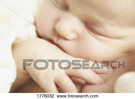 Stock Image - Sleeping newborn. Fotosearch