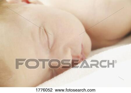 Sleeping newborn View Large Photo Image Stock Image - Sleeping newborn. Fotosearch