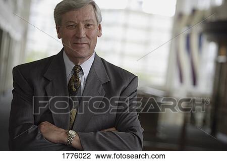 Suave senior businessman View Large Photo Image Stock Image - Suave senior businessman. Fotosearch