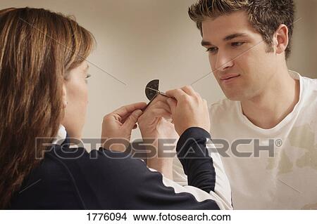 Teen having finger checked View Large Photo Image Picture - Teen having finger checked. Fotosearch
