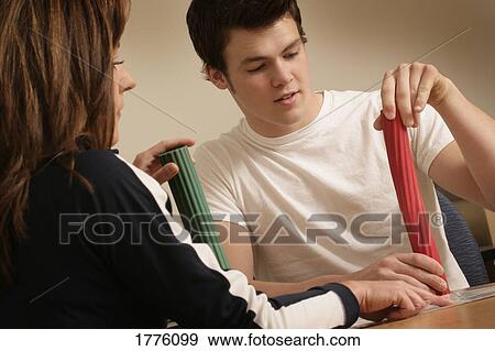 Teen working with physical therapist View Large Photo Image Stock Photo - Teen working with physical therapist. Fotosearch