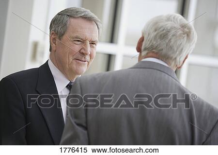 Stock Photography - Two older businessmen. Fotosearch