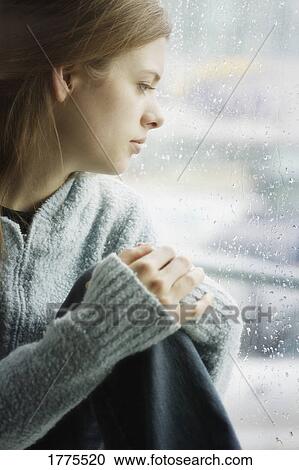 Watching the rain View Large Photo Image Stock Image - Watching the rain. Fotosearch