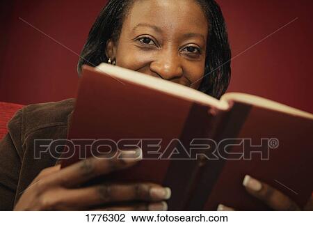Woman reading the Bible View Large Photo Image Stock Image - Woman reading the Bible. Fotosearch
