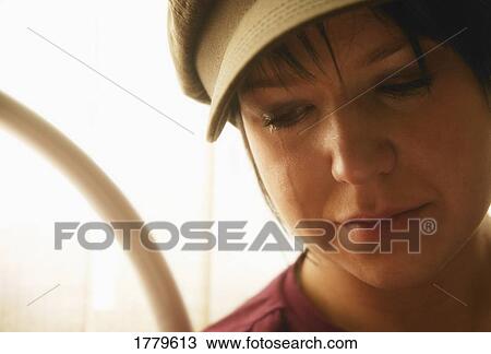 Stock Image - A crying teenager. Fotosearch