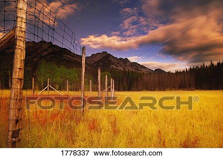 A fence and a mountain View Large Photo Image Stock Photo - A fence and a mountain. Fotosearch