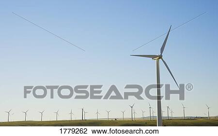 Stock Image - A field of wind turbines. Fotosearch