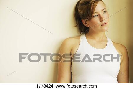 A pensive young woman View Large Photo Image Picture - A pensive young woman. Fotosearch