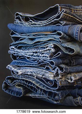 A pile of jeans View Large Photo Image Stock Photo - A pile of jeans. Fotosearch
