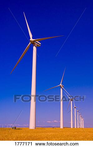 A row of windmills View Large Photo Image Stock Image - A row of windmills. Fotosearch