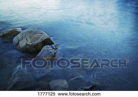 A stony river bed View Large Photo Image Stock Photography - A stony river bed. Fotosearch
