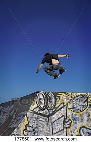 A teen at a skating park View Large Photo Image Stock Image - A teen at a skating park. Fotosearch