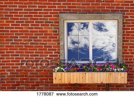 A window with a cloudy sky reflecting in it View Large Photo Image Stock Photo - A window with a cloudy sky reflecting in it. Fotosearch
