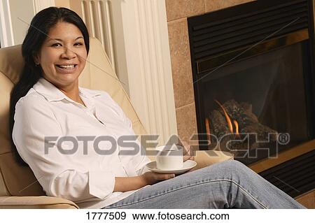 Aboriginal woman having coffee View Large Photo Image Stock Photo - Aboriginal woman having coffee. Fotosearch
