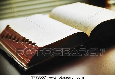 An open Bible View Large Photo Image Stock Photo - An open Bible. Fotosearch
