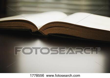 An open book View Large Photo Image Stock Photograph - An open book. Fotosearch