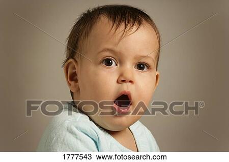 Baby yawning View Large Photo Image Stock Image - Baby yawning. Fotosearch