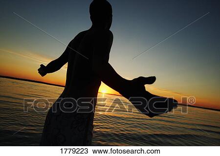 Boy with hands raised View Large Photo Image Stock Image - Boy with hands raised. Fotosearch