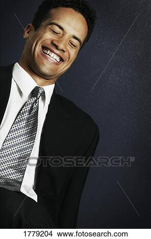 Picture - Businessman laughs. Fotosearch