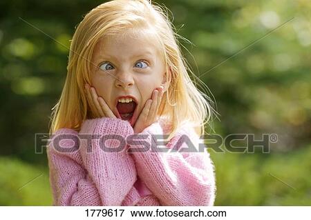 Stock Photo - Child has goofy expression. Fotosearch