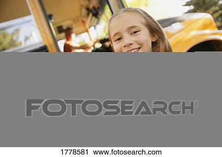 Child ready to board school bus View Large Photo Image Stock Image - Child ready to board school bus. Fotosearch