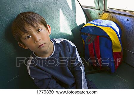Child rides school bus View Large Photo Image Stock Image - Child rides school bus. Fotosearch