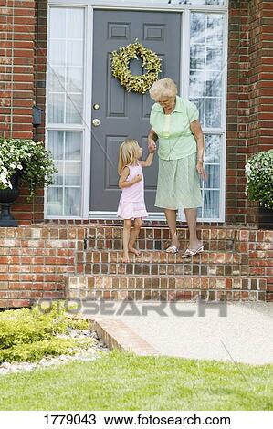 Child walks with grandma View Large Photo Image Stock Image - Child walks with grandma. Fotosearch