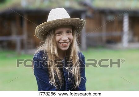 Child with straw hat View Large Photo Image Stock Photograph - Child with straw hat. Fotosearch