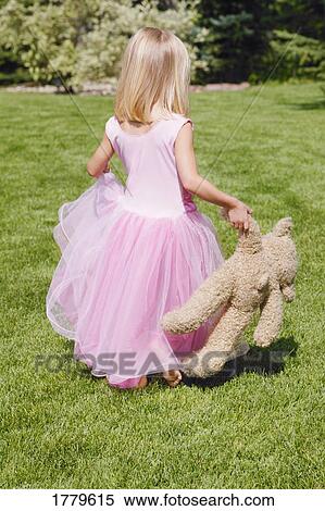 Stock Photography - Child with teddy bear. Fotosearch