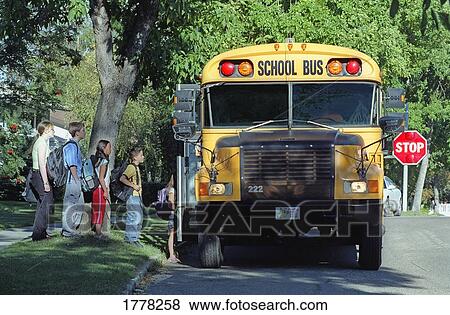 Children loading a school bus View Large Photo Image Stock Photo - Children loading a school bus. Fotosearch
