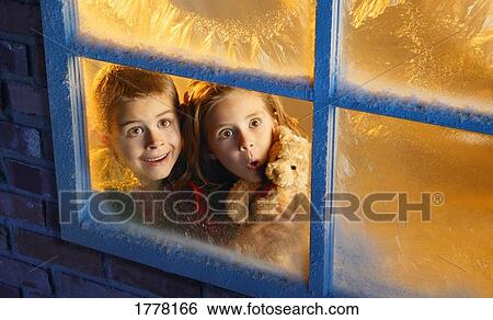 Children looking out window into night sky View Large Photo Image Stock Photograph - Children looking out window into night sky. Fotosearch