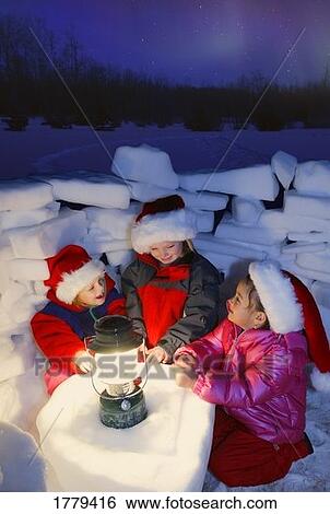 Children playing outdoors under the Northern lights View Large Photo Image Stock Photograph - Children playing outdoors under the Northern lights. Fotosearch
