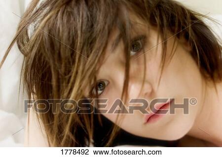 Stock Image - Closeup of a woman's face. Fotosearch