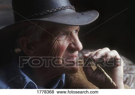 Stock Photo - Closeup of cowboy's face. Fotosearch