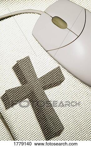 Stock Image - Computer mouse and cross on mouse pad. Fotosearch