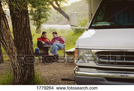Picture - Couple camping. Fotosearch