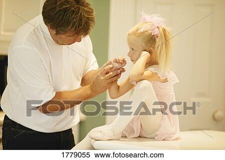 Dad fixes scratch View Large Photo Image Stock Photography - Dad fixes scratch. Fotosearch